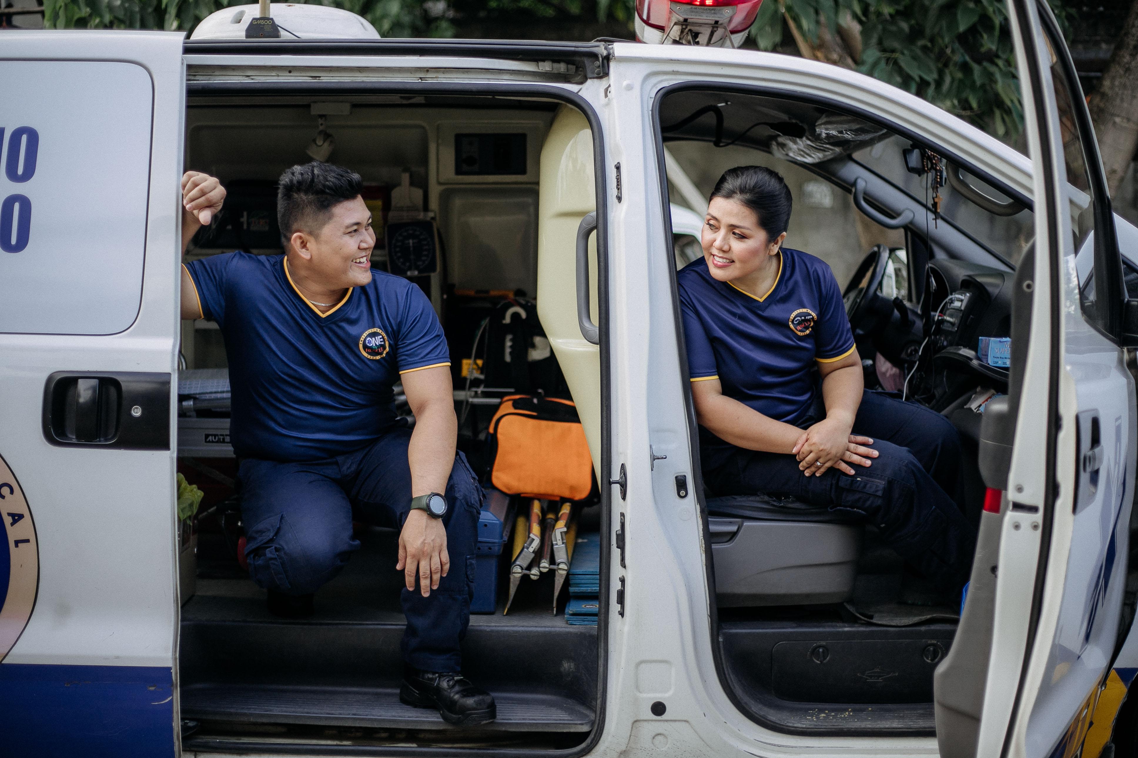 EMS crew talking in ambulance